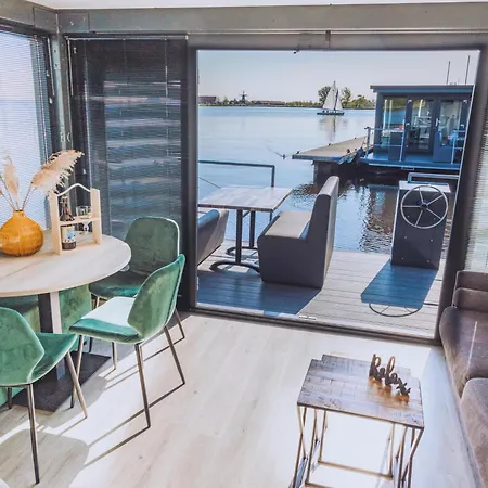 Tiny Houseboat Parel I - Airco Chalé